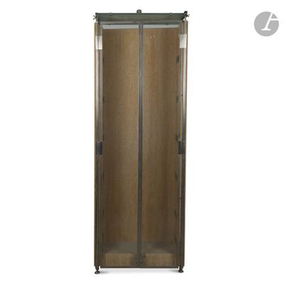 an image of a metal cabinet with a sliding door