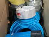 a box with a bunch of hoses inside of it