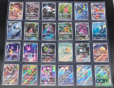 il y a plein de cartes Pokémon différentes dans la boîte