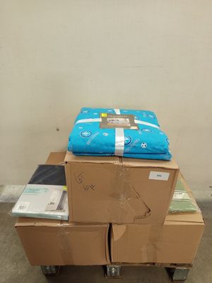 boxes stacked on top of each other on a cart in a room