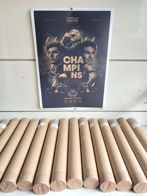 many rolls of brown paper sitting on a table