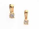 paire de boucles d'oreilles en or jaune ornées d'un seul diamant