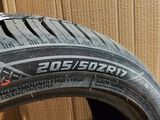 a close up of a tire on a box with a box in the background