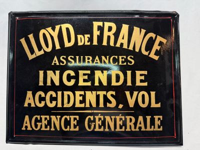 une enseigne indiquant « Lloyd de France Assurances Incendie, Accidents, Vol – Agente Générale »