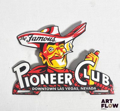 un pin's sur lequel figure l'image d'un homme portant un sombrero