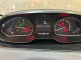a close up of a car dashboard with a speedometer