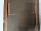 a picture of a mirror hanging on a wall
