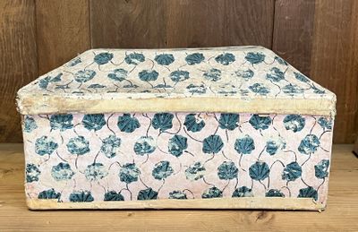 an image of a small box with a floral pattern on it