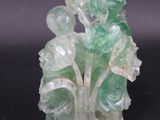 chinese carved jade figurine of a tree with green leaves
