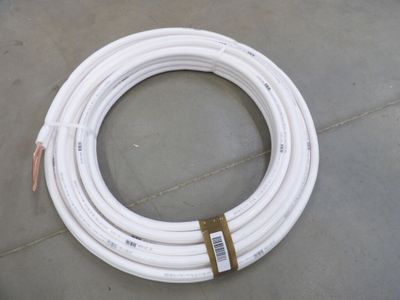a white hose that is on the ground
