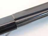 a pen that is laying on top of a table