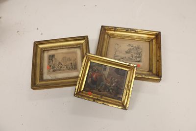three framed pictures of a man and a woman in a room