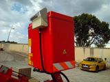 an image of a red box with a yellow car in the background