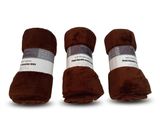 three rolls of brown flee blankets on a white background