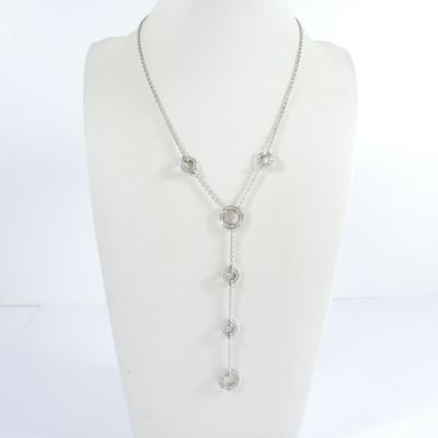 a close up of a necklace on a mannequin mannequin