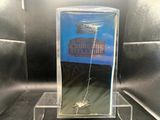 a clear display case with a picture of a plane on it