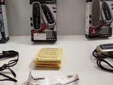 a lot of electronic gadgets on the table