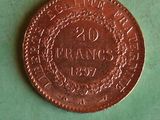 a close up of a penny on a table with a green background