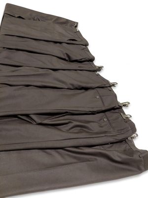a close up of a piece of cloth with zippers on it