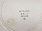 an image of a close up of a plate with writing on it