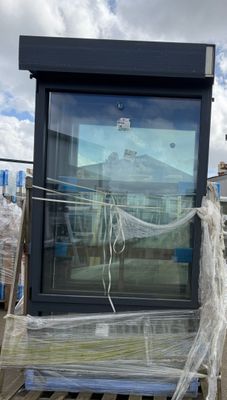 a large window that is on a pallet outside