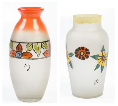 two vases with different designs on them on a white background
