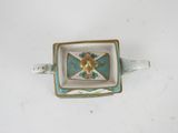 a small square bowl with a gold heart on it