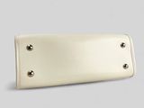 white leather wallet with rivets and studs on the front