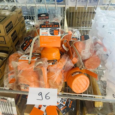 a display of oranges and orange juices for sale in a store