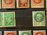 several different types of stamps are on display in a display case
