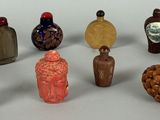 a lot of small bottles that are sitting on a table