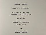 a menu for a restaurant on a white table