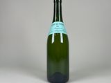 a bottle of wine that is sitting on a table