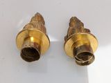 pair of antique brass candlesticks on a white background