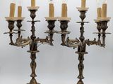 pair of antique brass candelabs with figures and candles