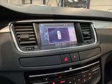 the dashboard of a car with a digital display in the center