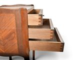 a chest of drawers that is open on a white background