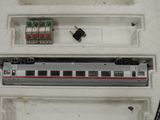a train that is sitting inside of a box
