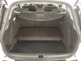 a trunk of a car with the back seats folded down