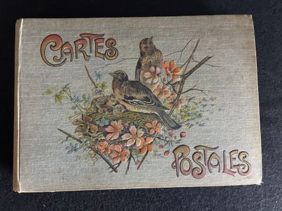 Un album de cartes postales et son contenu de CPA sur le thè…