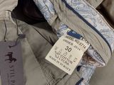 an image of a close up of a pair of pants with a label on it