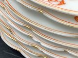a lot of plates stacked on top of each other