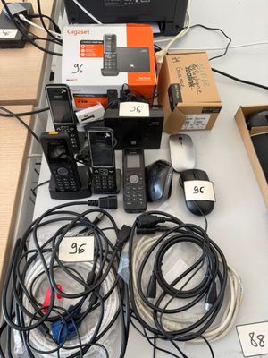 a lot of electronics that are on the table