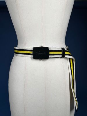 a mannequin torso with a yellow and black belt