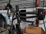 a machine that is sitting in a garage with a box