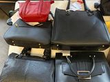 a lot of bags that are sitting on a table