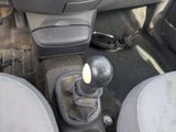 an image of a car ' s interior with the gear lever in the center