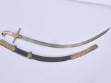 pair of two swords on a white surface with a wooden handle