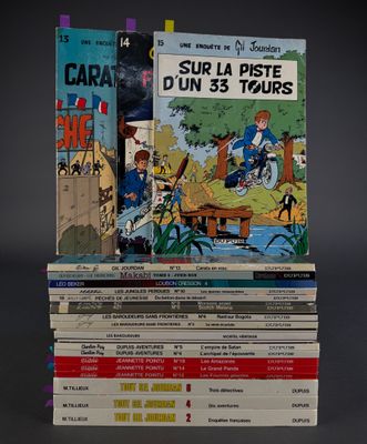 several books stacked on top of each other on a table