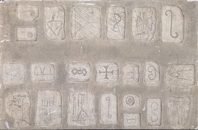 a picture of a stone with a lot of writing on it
